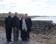 From left to right, Deputy County Executive Marc Rider, Deputy Director of Planning Chris White, Acting County Executive Adele B. Reiter, and Deputy County Executive Ken Crannell visit trail construction in-progress at the Glenford Dike, in the Town of Hurley.